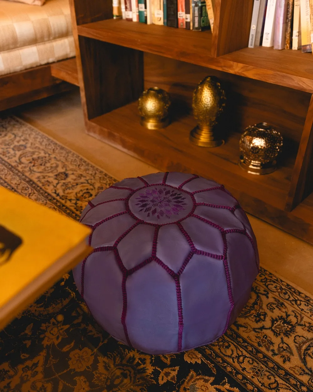Moroccan Leather Pouff, and other souvernirs decorated in a Moroccan Home