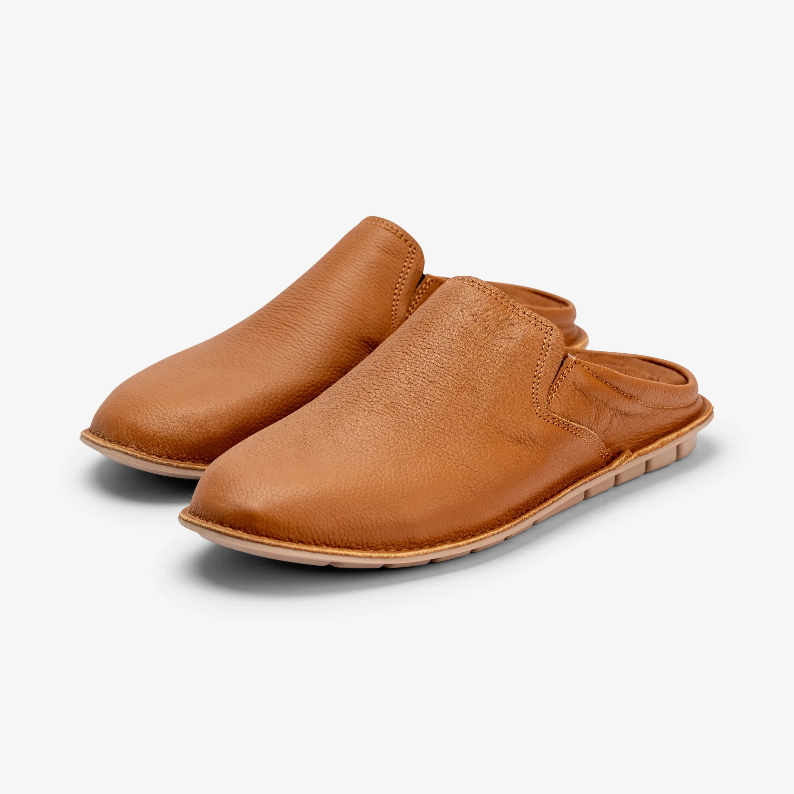Shop Tan Leather Moroccan Mule Slippers – handcrafted men’s shoes with soft leather, cushioned sole & artisan quality. One-of-a-kind, made in Morocco.