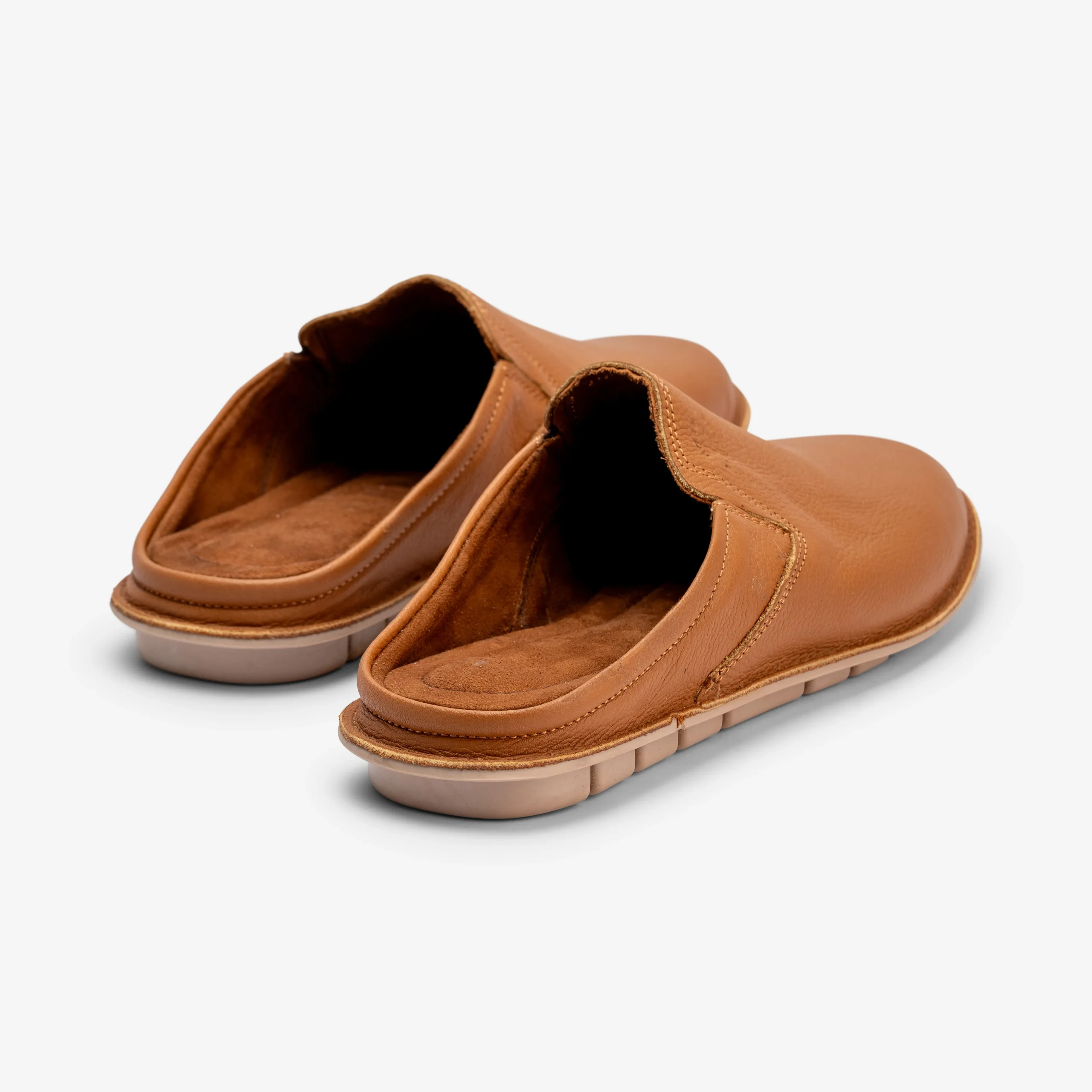 Shop Tan Leather Moroccan Mule Slippers – handcrafted men’s shoes with soft leather, cushioned sole & artisan quality. One-of-a-kind, made in Morocco.