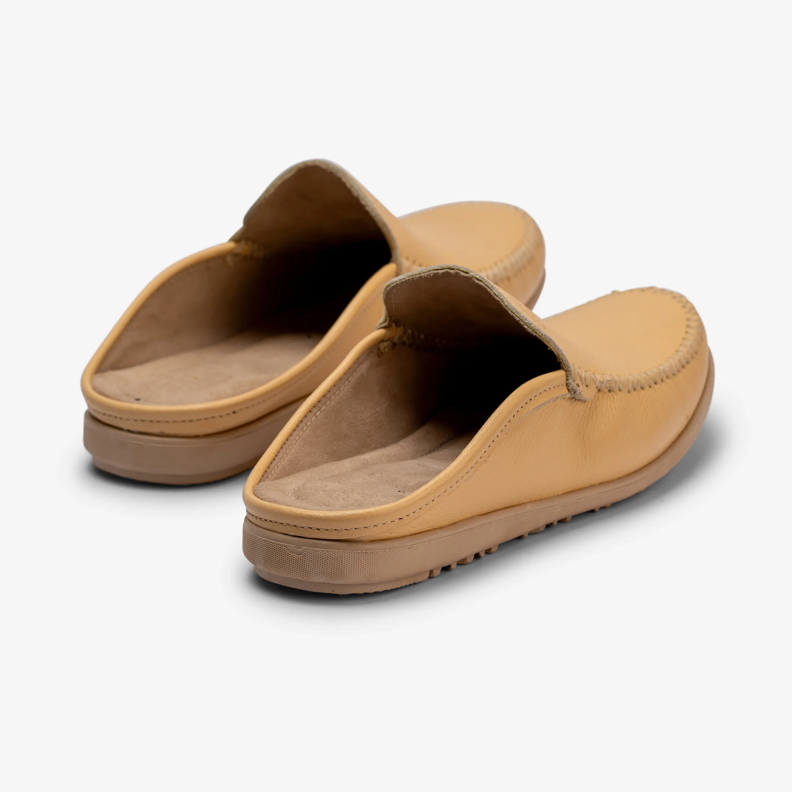 Step into timeless Moroccan craftsmanship with these handmade tan leather mule slippers. Stylish, lightweight, and perfect for everyday comfort.