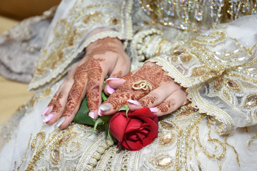 Moroccan Wedding Traditions That Still Influence Modern Bridal Style - red flower